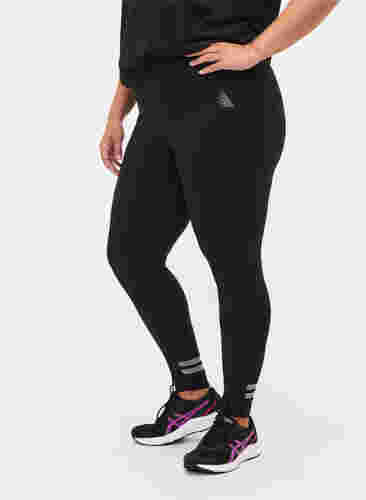 Sportlegging met reflex en fleece aan de binnenkant, Black, Model image number 2