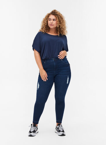 Super slim fit Amy jeans met slijtage, Dark blue denim, Model image number 0