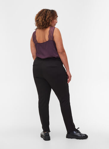Pantalon moulant avec poches et fermeture éclair, Black, Model image number 1