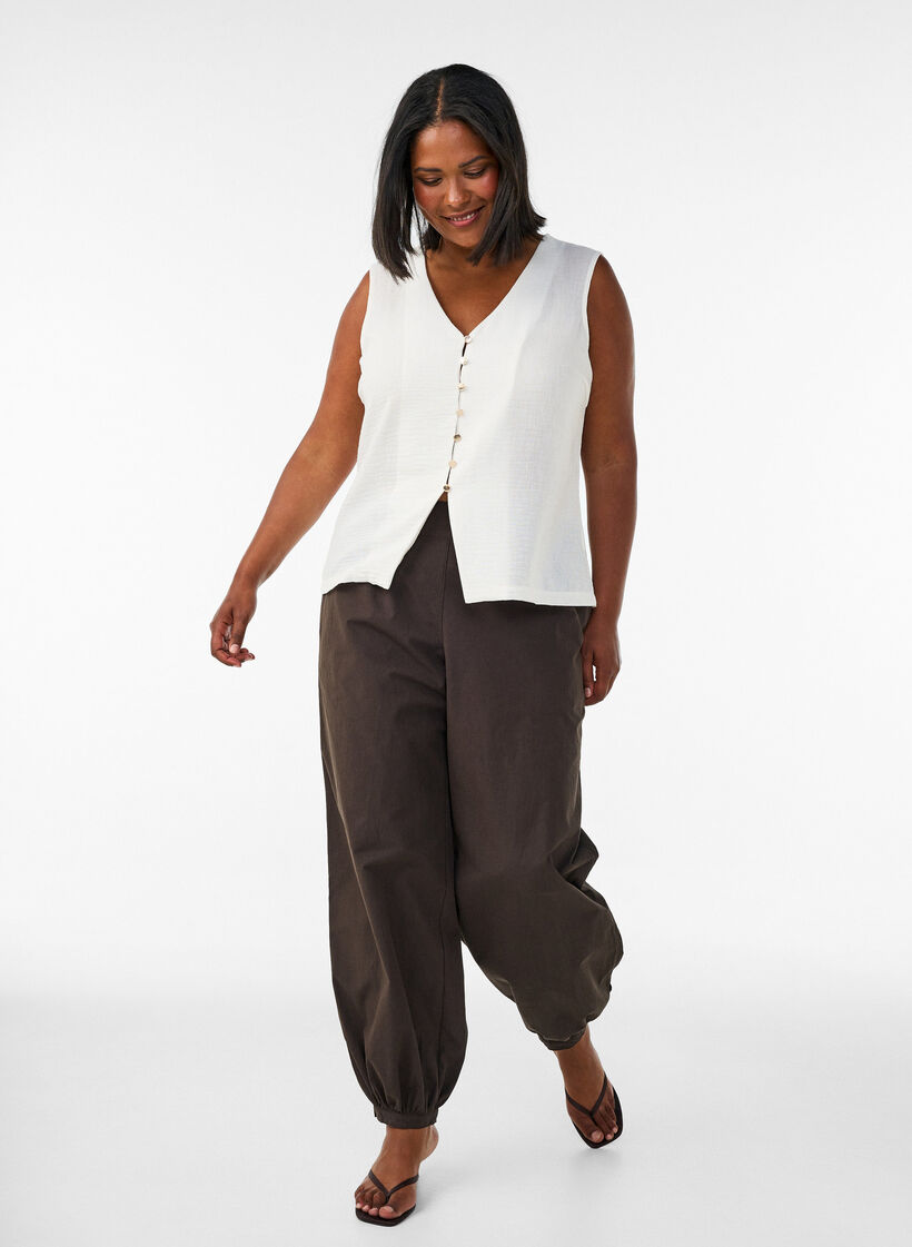 Mouwloos vest met V-hals en knopen, Vanille, Model image number 1