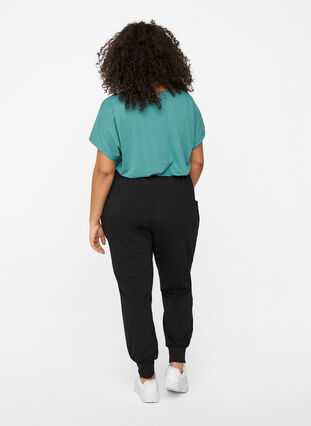 Pantalon ample avec poches, Black, Model image number 1