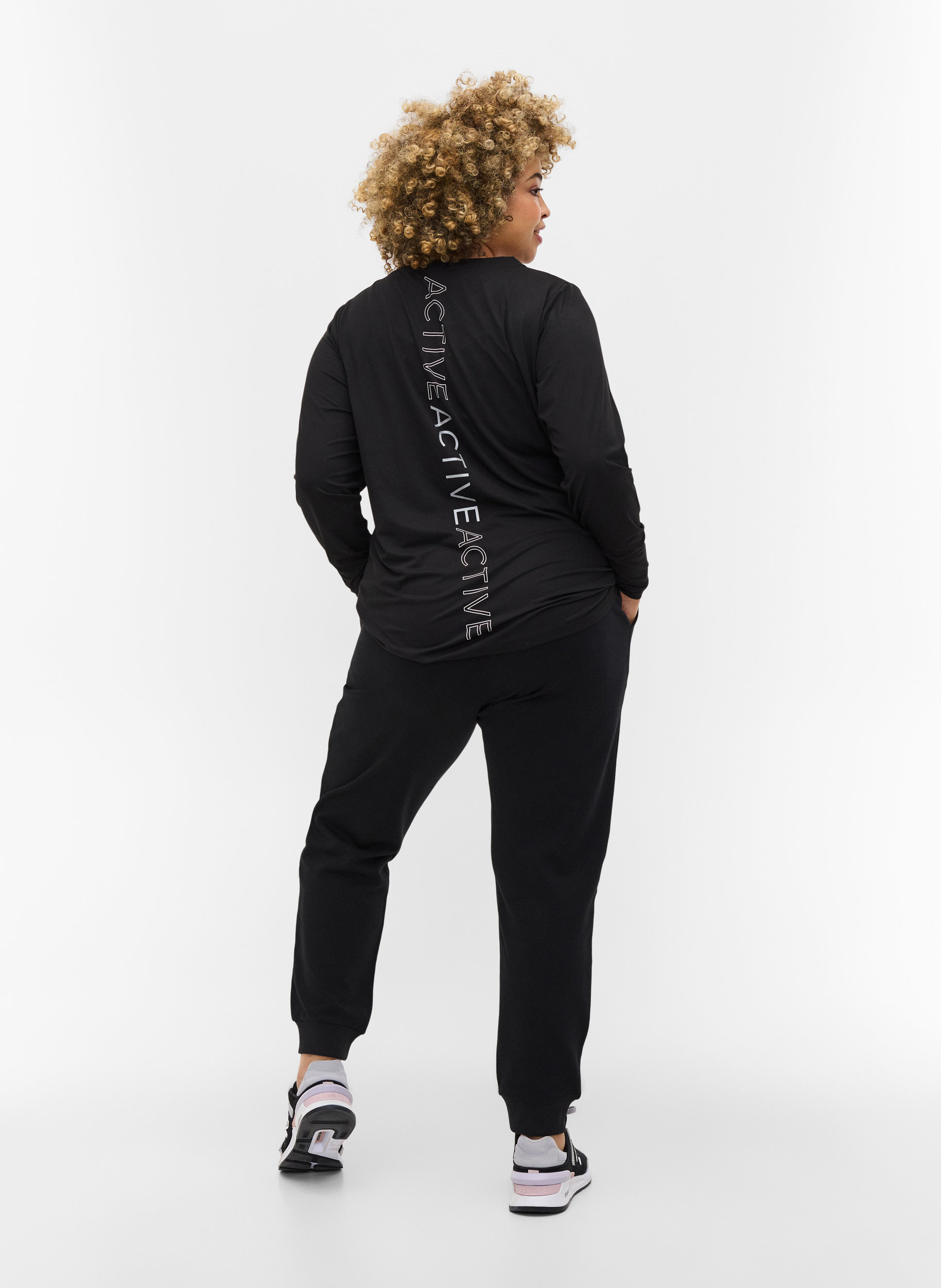 Pantalon d'entraînement uni avec poches, Black, Model image number 1